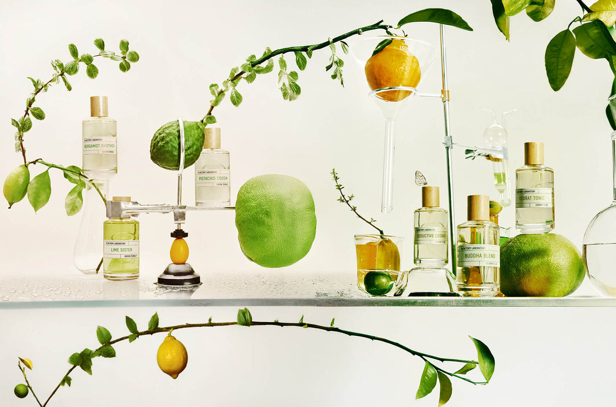 Liquides Imaginaires The Imaginarium bottles with citrus fruit