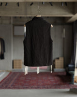ハンガーにかかった ARCHIVIO J.M. Ribot の GL23 / FXM（Dark Brown Herringbone） 背面